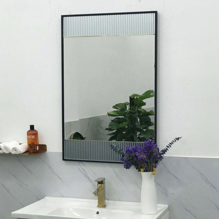Is the Black Metal Frame Bathroom Mirror easy to clean and maintain? 